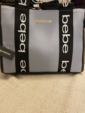 bebe Light Gray Tote with Black Logo Straps and Gold Accent